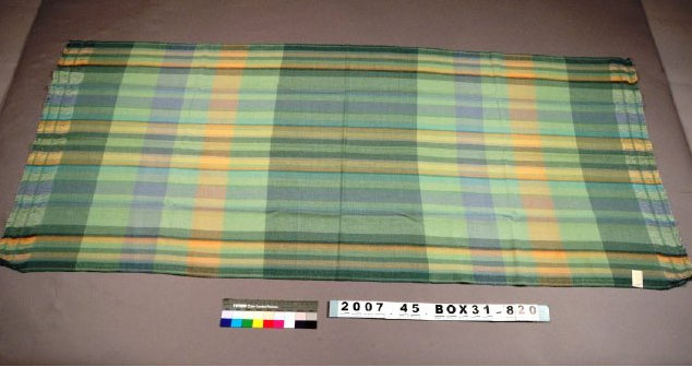 This stole was woven in 1938 and made with wool and rayon materials.
